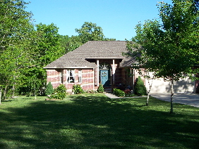 New Residential Construction: Typical mid-range brick home